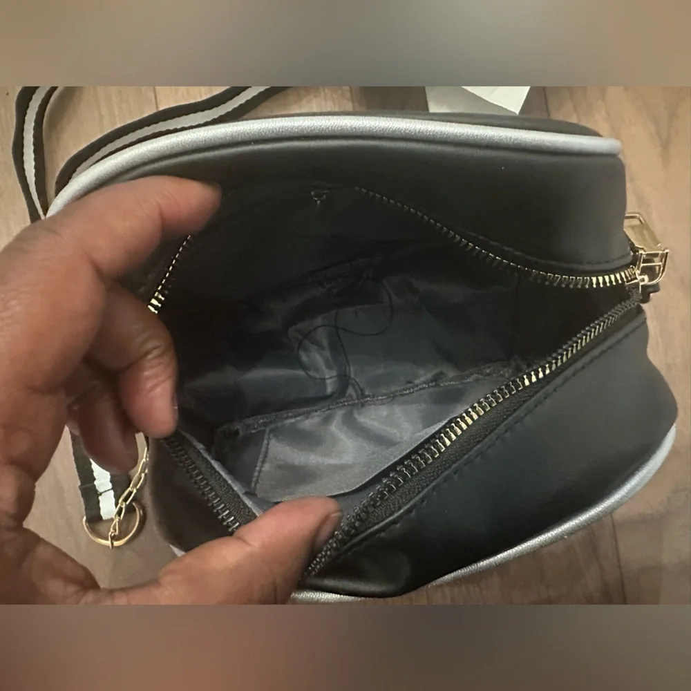 NWOT Stylish Black and White Camera Crossbody Bag